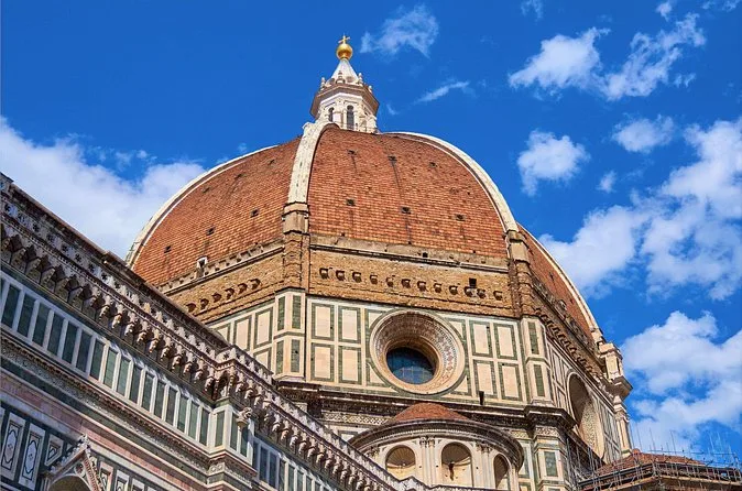 The dome of Florence Cathedral against a clear sky